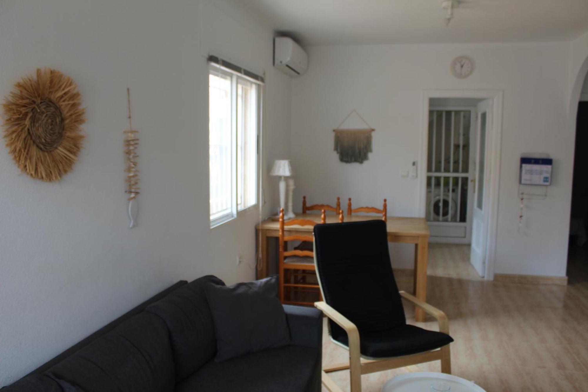 With 2 Bedrooms And Roof Terrace In The Center Of La Zenia. Free Wifi. Сasa de vacaciones *